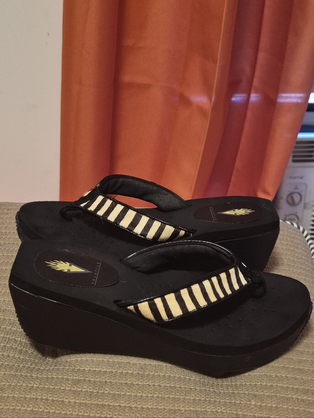 Volatile Black Platform Flip Flops with Zebra-Print Straps